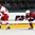 GRAND FORKS, NORTH DAKOTA - APRIL 24: Denmark's Rasmus Mohr #24 chases the puck while Latvia's Renars Krastenbergs #17 defends during relegation round action at the 2016 IIHF Ice Hockey U18 World Championship. (Photo by Matt Zambonin/HHOF-IIHF Images)

